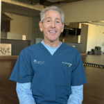Dr. Scott Greenapple leading a Qi Gong session promoting balance, posture, and bone health.