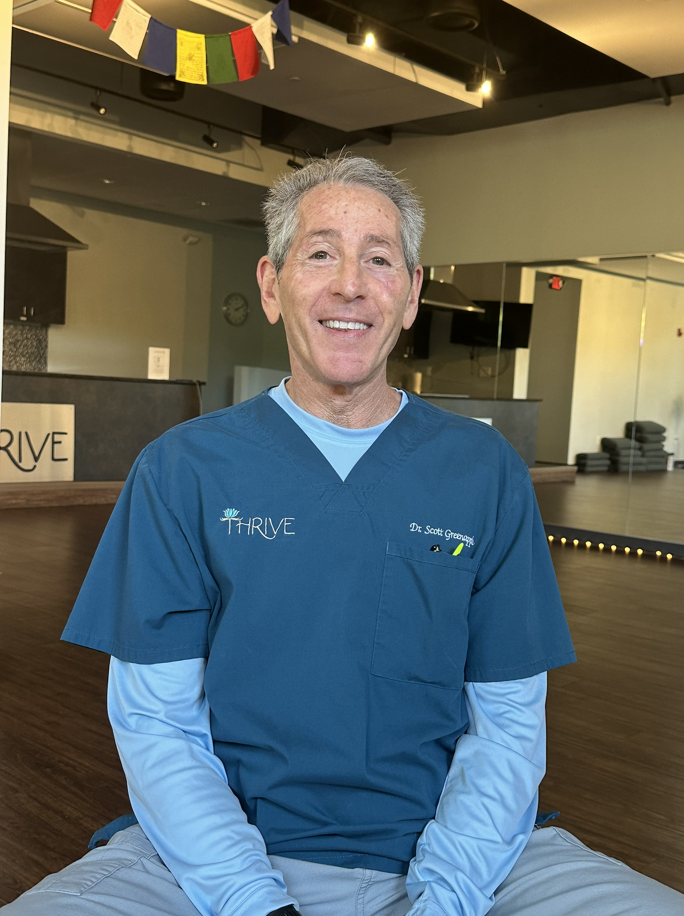 Dr. Scott Greenapple leading a Qi Gong session promoting balance, posture, and bone health.