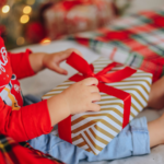 Peaceful holiday scene with candles, and presents symbolizing calm and relaxation during the holiday season.