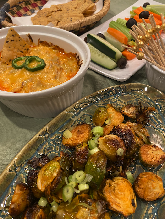 Game day buffalo recipes: buffalo sauce, buffalo Brussels sprouts, and chicken buffalo dip.