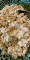 High protein chicken salad made with Greek yogurt and eggs in a white bowl.