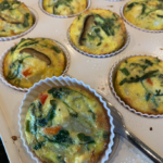 High-protein egg muffins made with vegetables and cottage cheese in a muffin pan