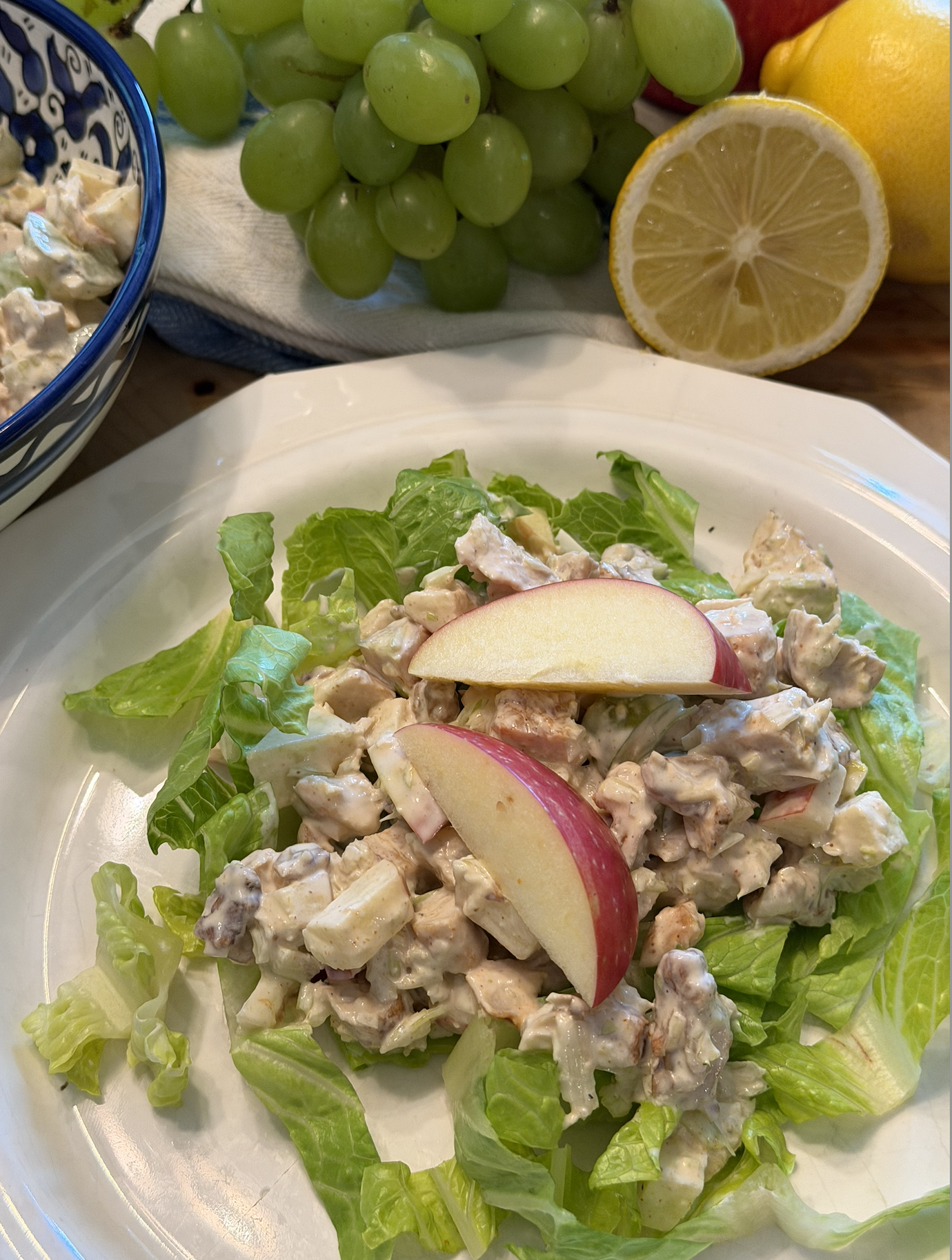 Healthy Waldorf chicken salad with apples, grapes, walnuts, and BBQ-seasoned chicken