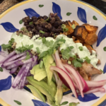 picture of Nancy's chicken onion avocado black bean bowl