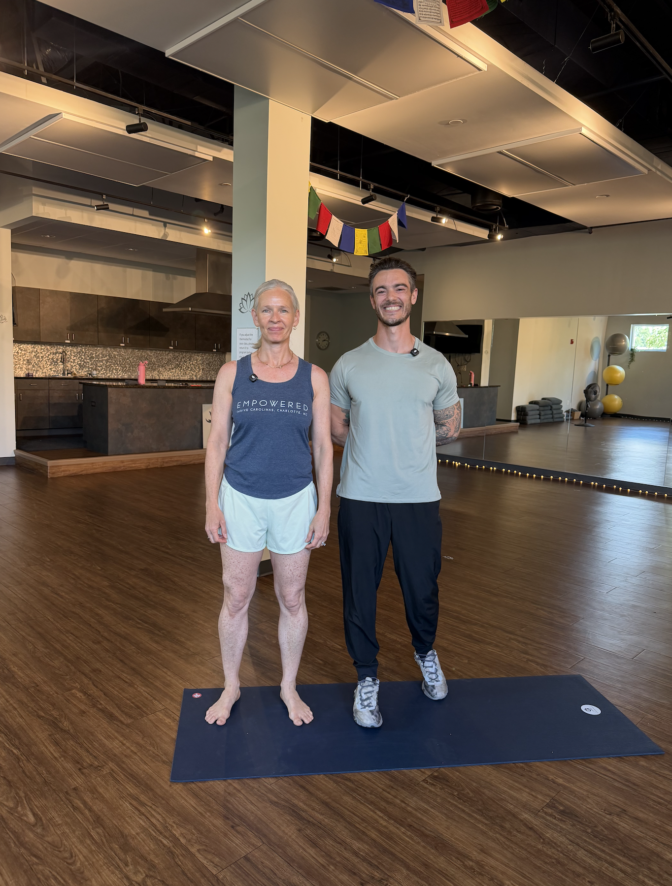 Harlee Palmer and Alan demonstrating plank modifications during Thrive's Summer Challenge